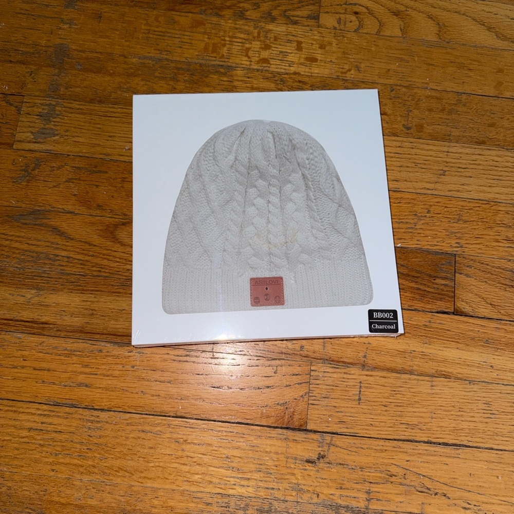 Cable Knit Beanie with Bluetooth. New in sealed box